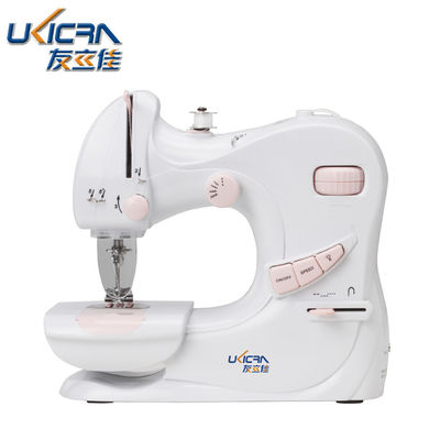 Mini-huishoudelijke naaimachine UFR-601 met 0-5 mm naaldlengte in witte en roze kleur